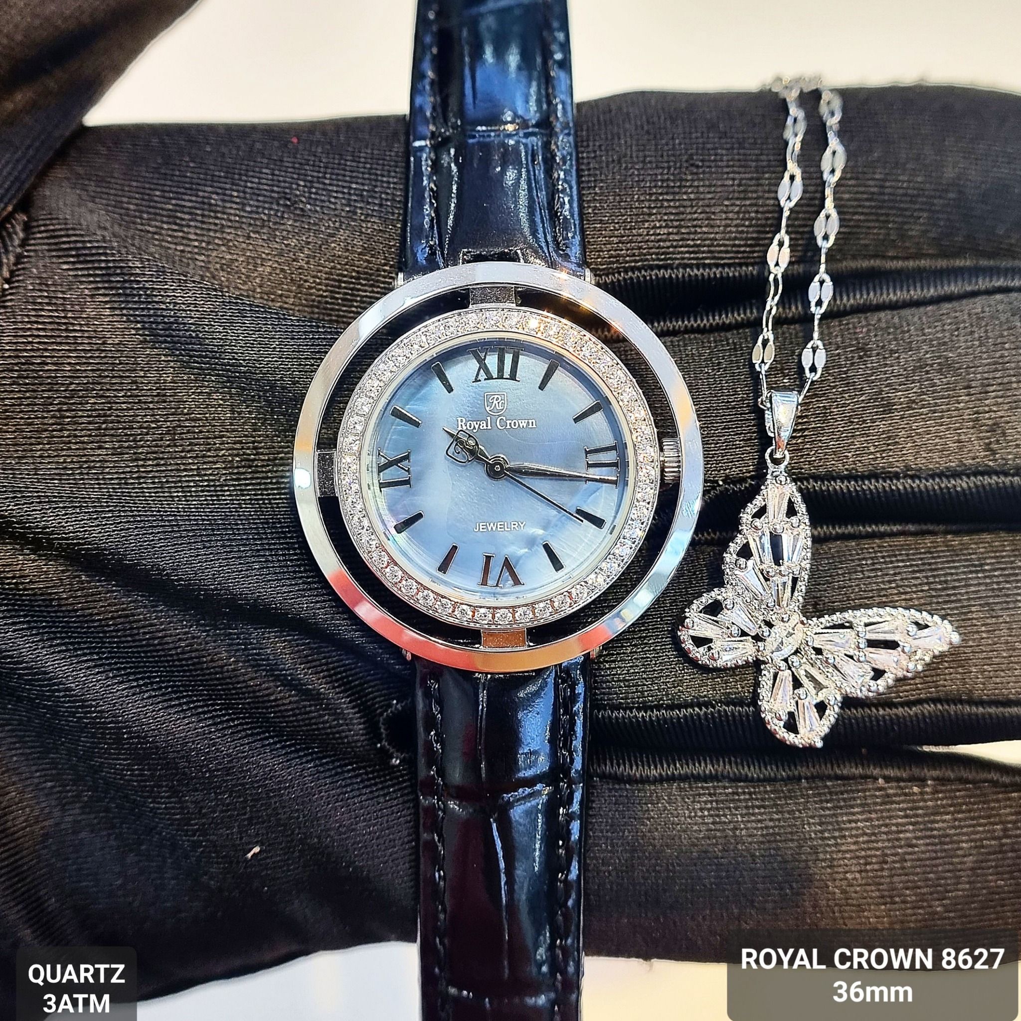 (ĐỒNG HỒ NỮ) Royal Crown 8627 dây da đen mặt xanh viền đá