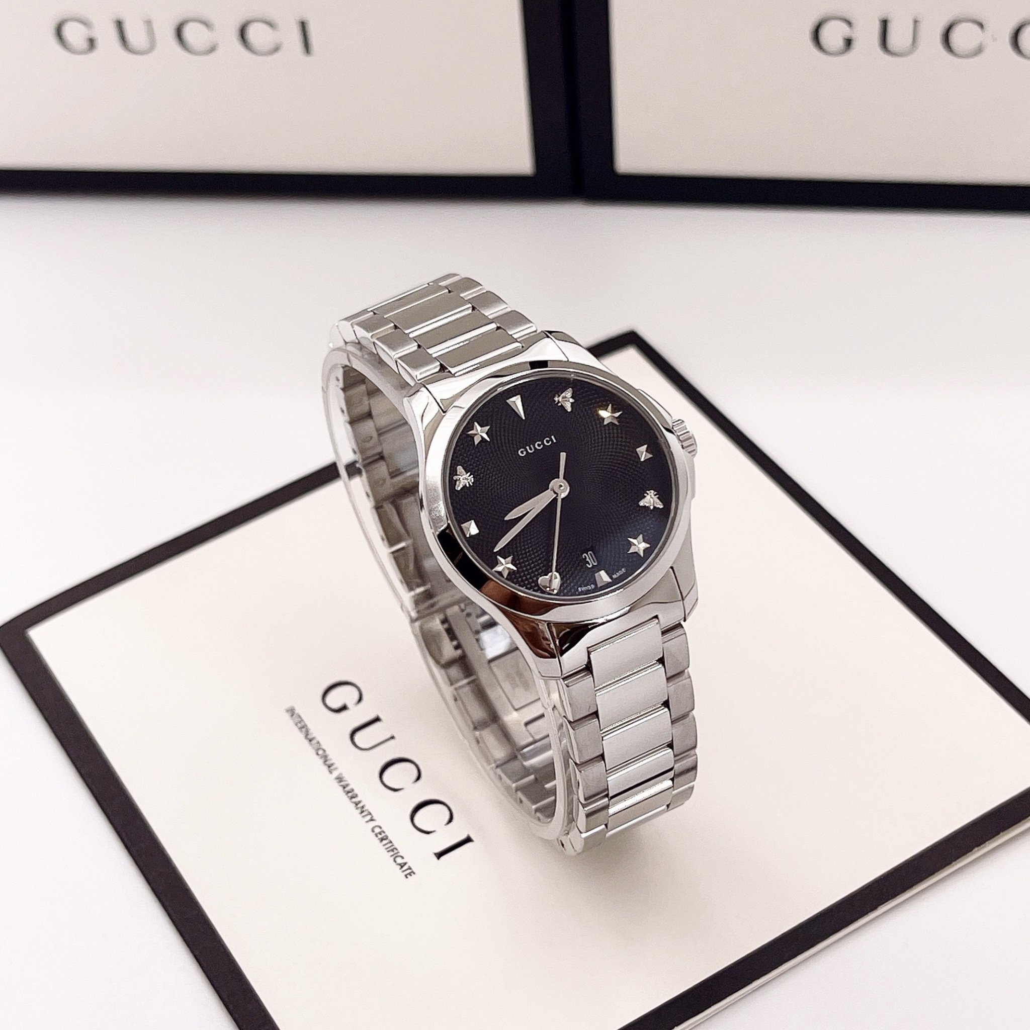 (ĐỒNG HỒ NỮ) Gucci G Timeless Black Dial Silver Watch YA12657329mm